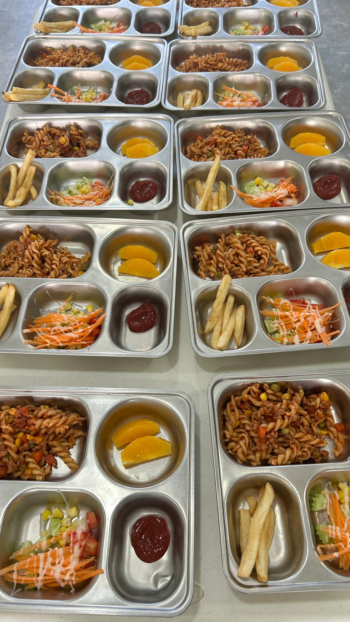 Rows of plated meal trays ready to be served